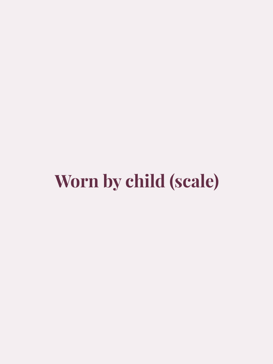 Worn by child (scale)
